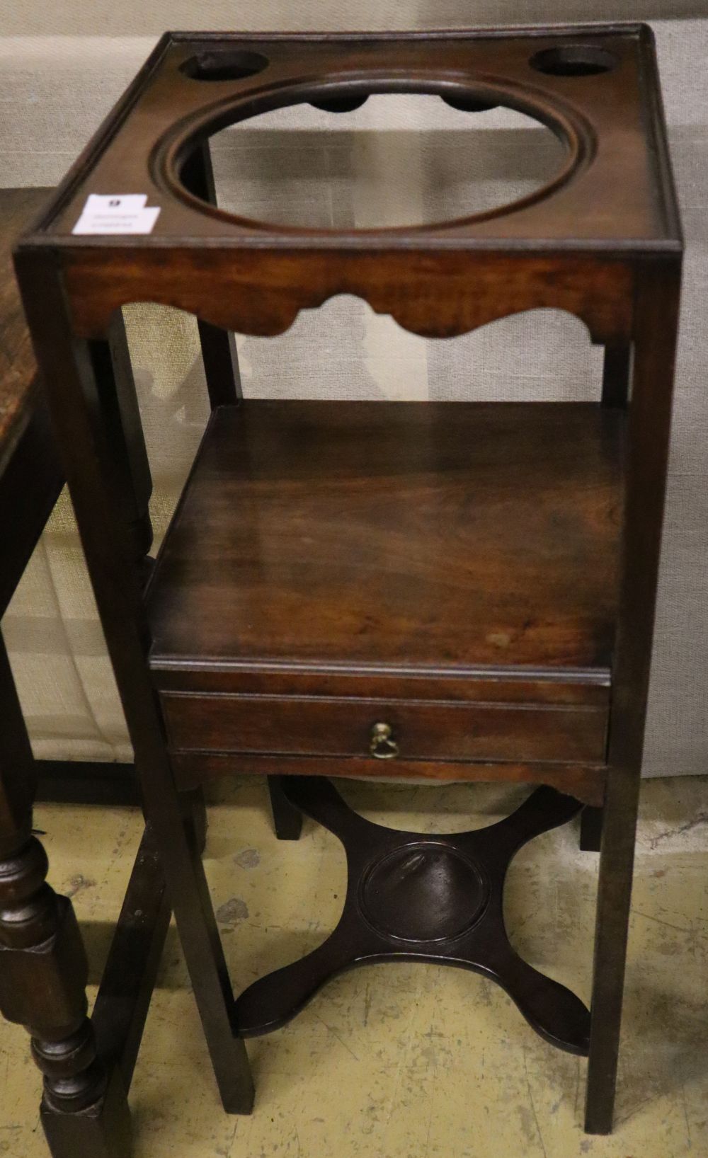 A George III mahogany washstand, width 34cm depth 34cm height 82cm